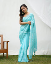 Safron Sky Blue Sequence Worked Heavy Georgette Saree